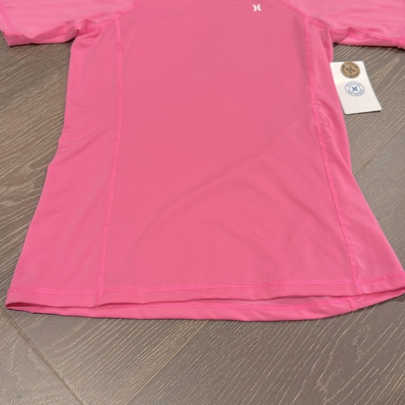 NWT! HURLEY solid pink short sleeve rash guard. Size small. - Picture 3 of 6